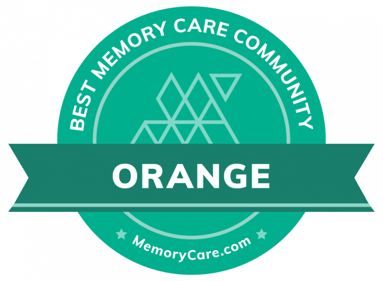 Memorycare.com award sticker reads - best memory care community - orange